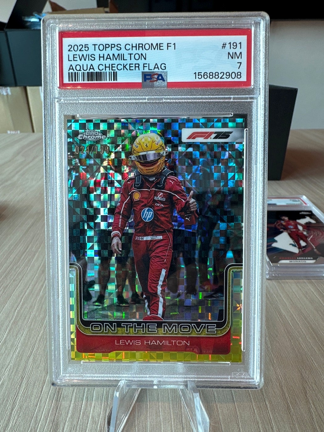 2025 Topps Chrome Lewis Hamilton Aqua Checker Flag #191 024/199 PSA 7