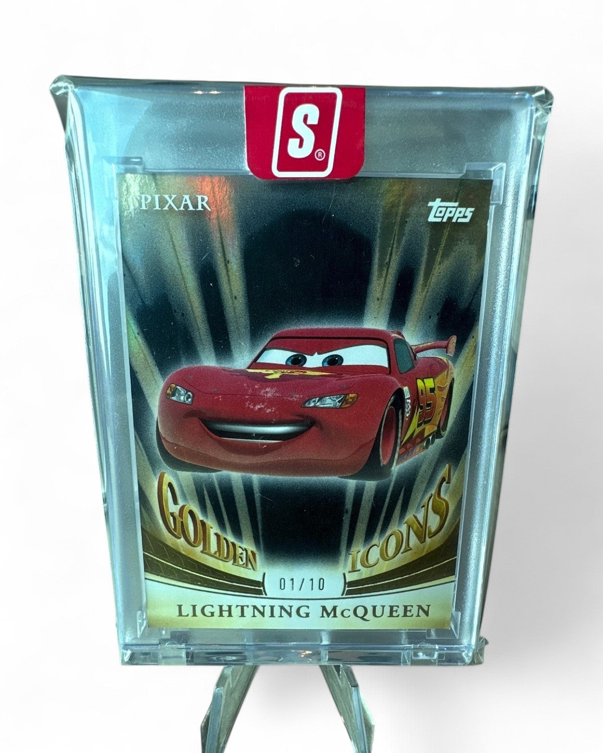 2025 Topps Pixar Gold Golden Icons (Encased) Lightning McQueen Black #GI-36 01/10
