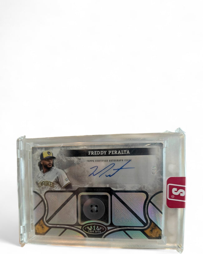 2025 Topps Tier One Autographed Tier One Relic Freddy Peralta Buttons #AT1R-FP Auto 4/5